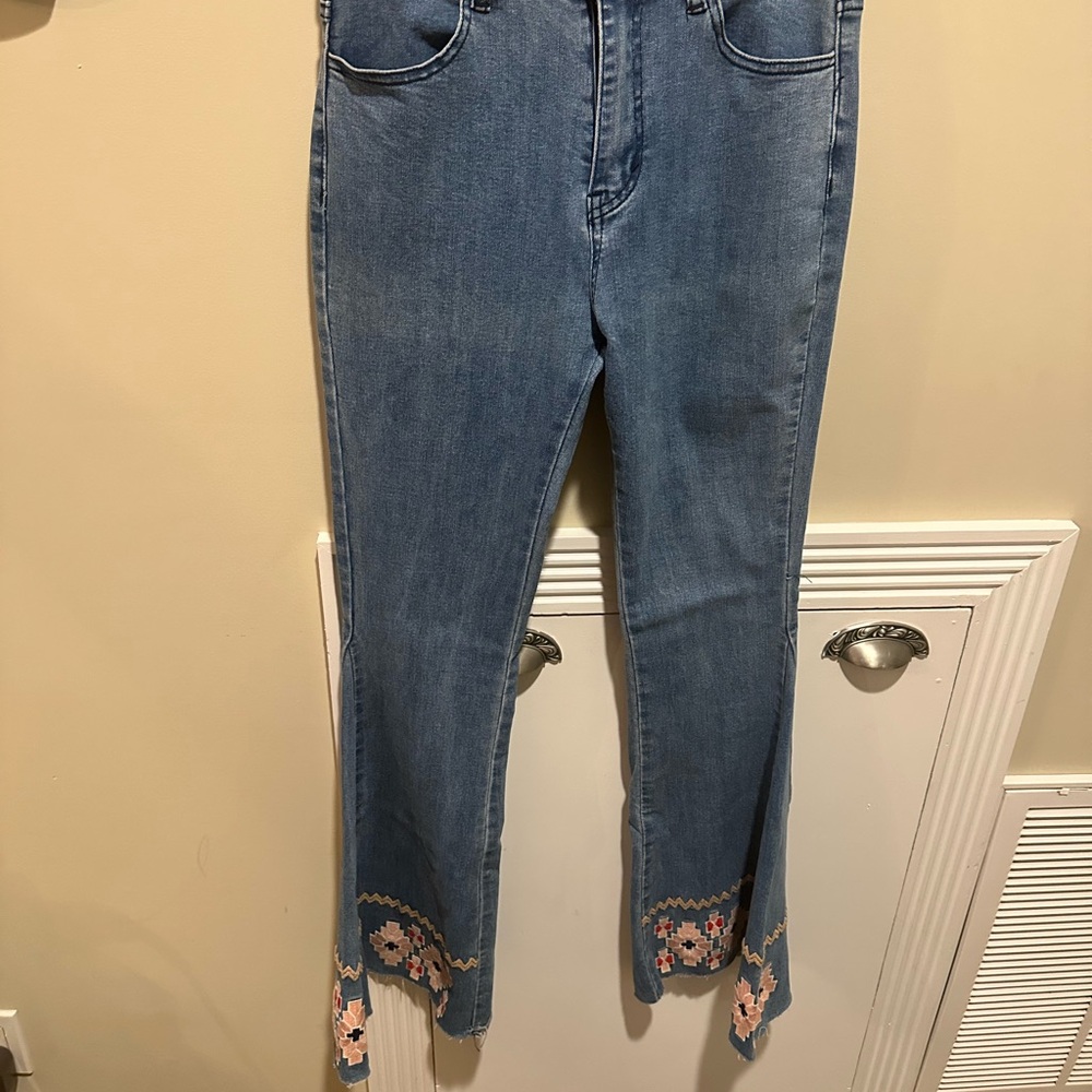 Elegant Blue Flare Jeans with Embroidered Details